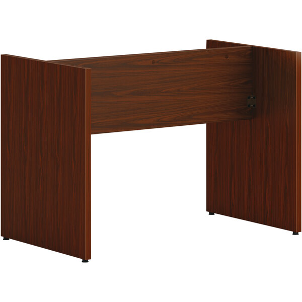 A HON mahogany laminate slab base for a conference table.