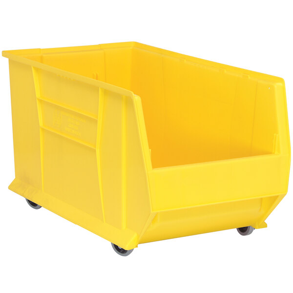 A Quantum yellow plastic bin with wheels.