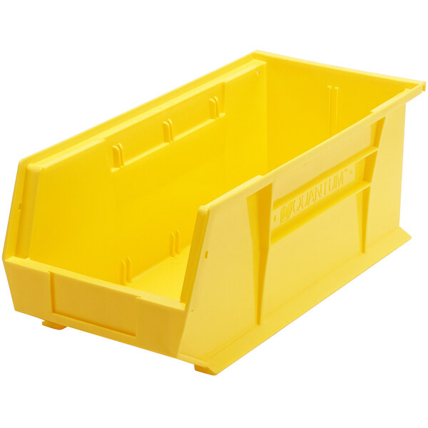 A yellow plastic Quantum hanging bin with a lid.