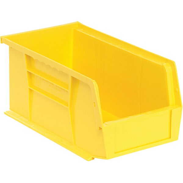 A close up of a yellow Quantum hanging bin with a handle.