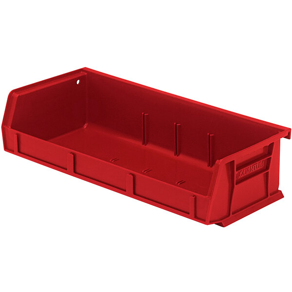 A red plastic container with two compartments and holes.