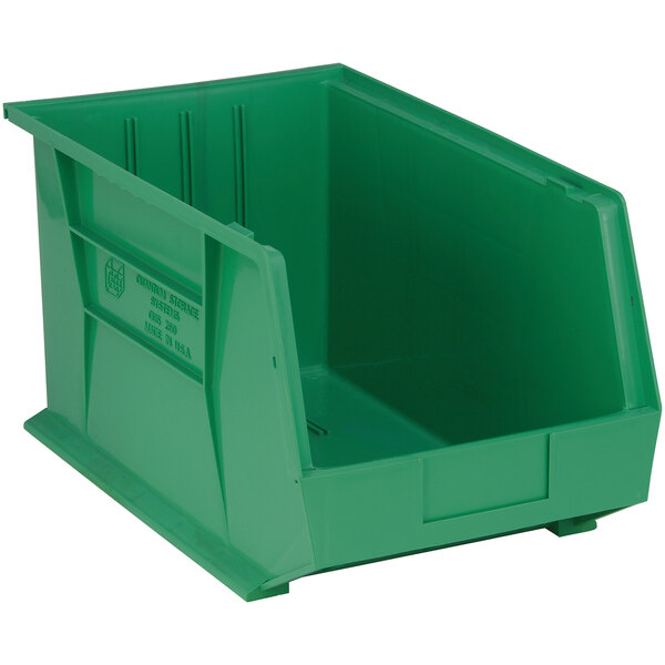 A green plastic Quantum hanging bin with a black handle.