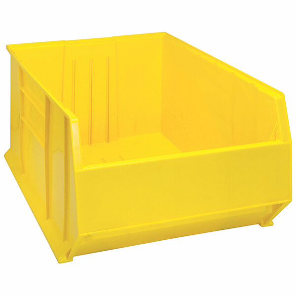 A yellow plastic Quantum storage bin.