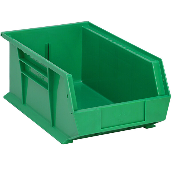 A green plastic Quantum hanging bin with a handle.