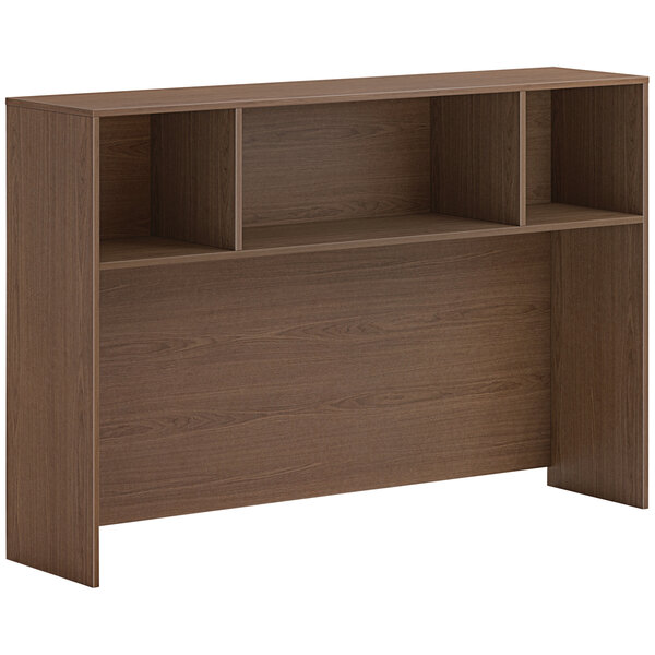 A brown HON laminate desk hutch with shelves.