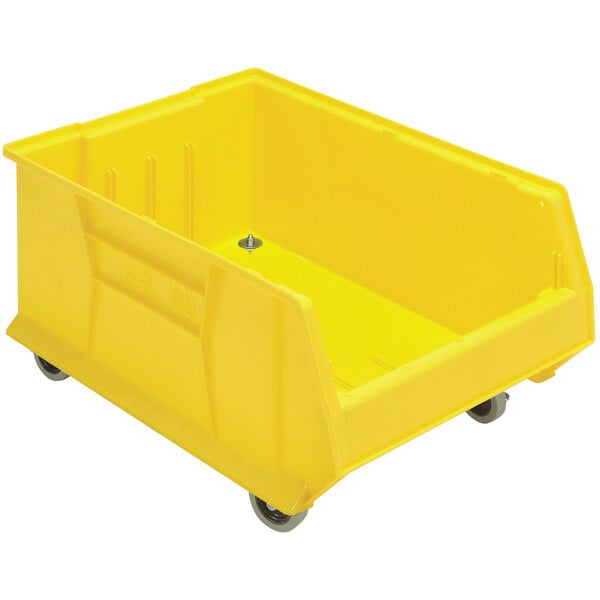 A Quantum yellow plastic storage bin with wheels.