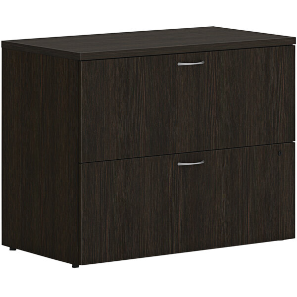 A Java oak HON lateral file cabinet with 2 drawers.