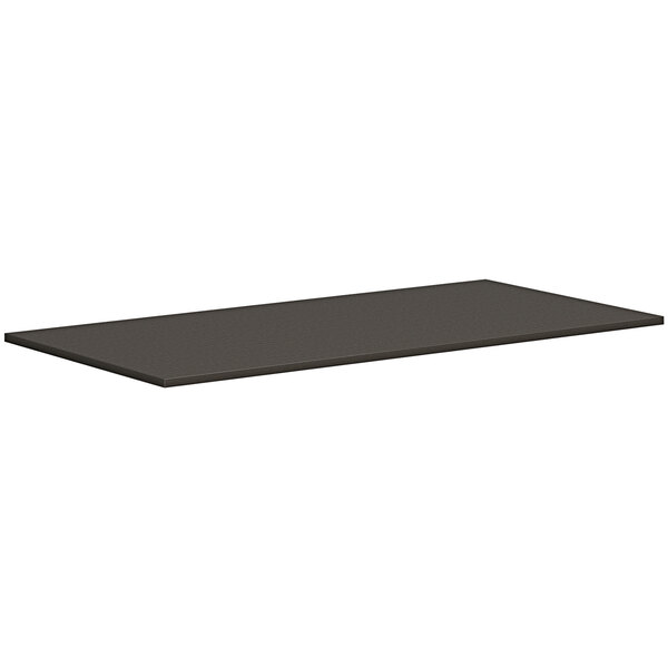 A rectangular slate teak laminate table top in black.