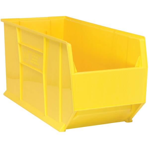 A yellow Quantum storage bin with a lid.