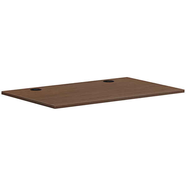 A rectangular brown wooden table top.
