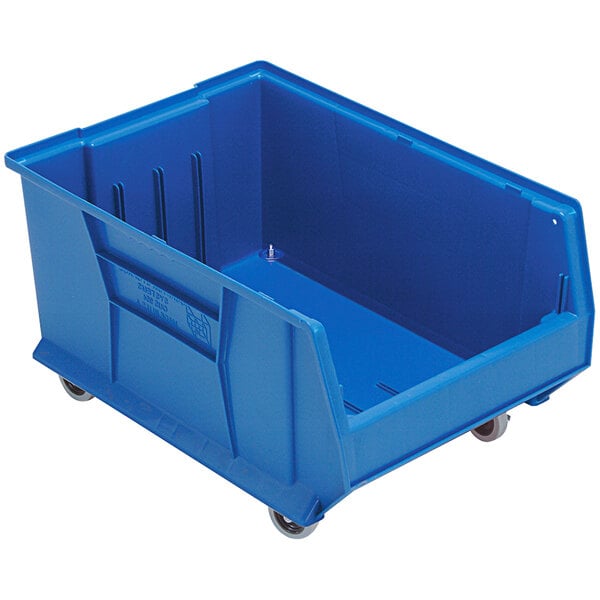 A Quantum blue plastic storage bin with wheels.