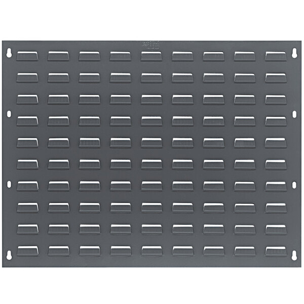 A Quantum grey steel louvered panel with holes.
