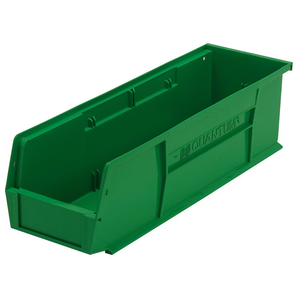 A green Quantum plastic hanging bin with a handle.
