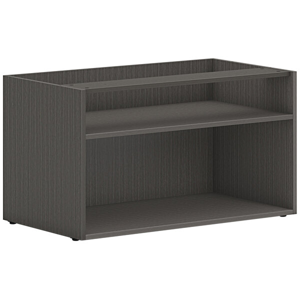A black HON low open storage credenza shelf with two shelves.