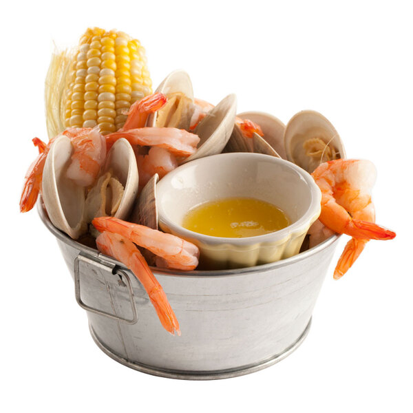 A round galvanized metal tub filled with shrimp, corn, and liquid.