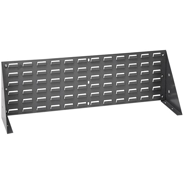 A black rectangular metal rack with rectangular holes.