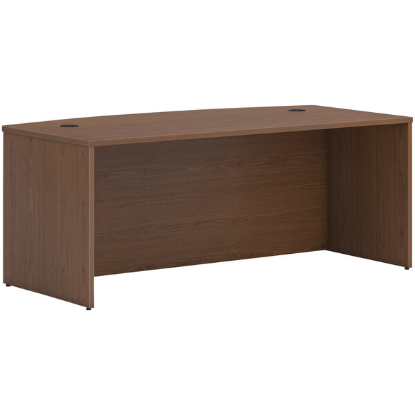 A brown rectangular HON Mod desk with a wooden top and a drawer.