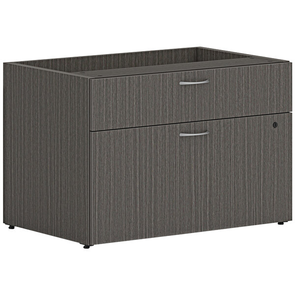 A slate gray HON personal credenza with 2 drawers.