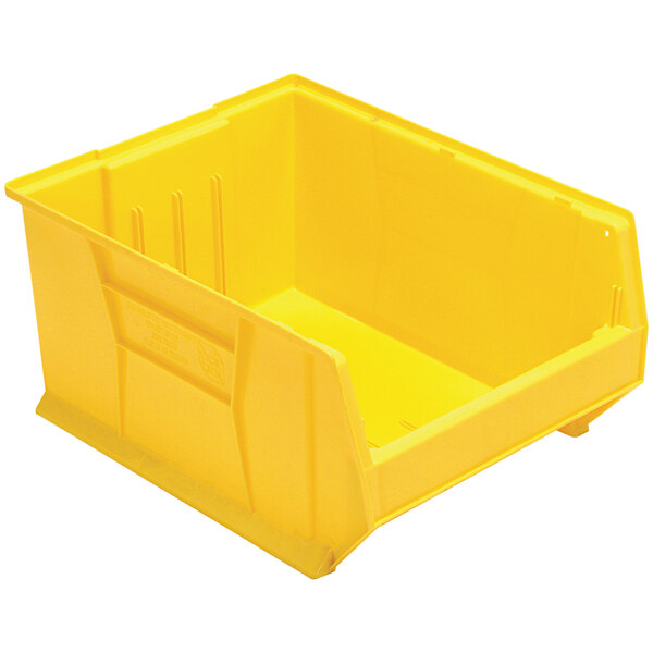 A Quantum yellow plastic storage bin.