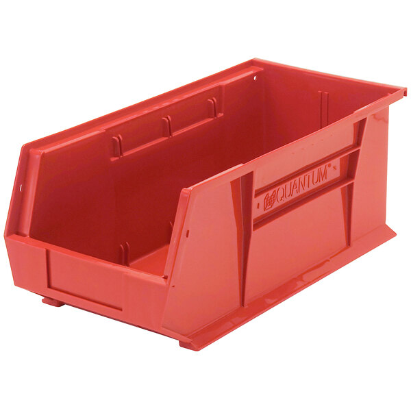 A red plastic bin with a handle.