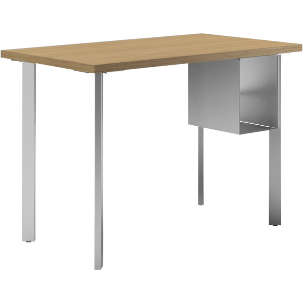 A HON wooden desk with metal U-storage shelves.