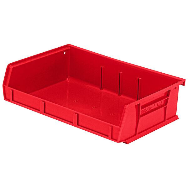 A red plastic Quantum hanging bin with holes.