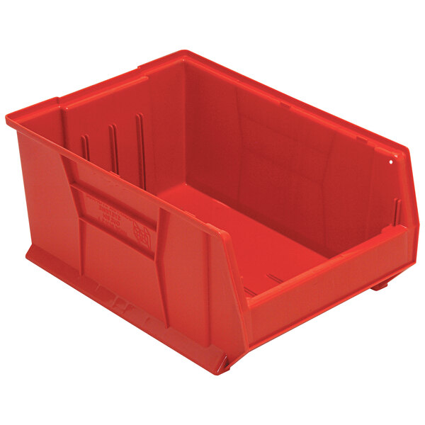 A Quantum red plastic bin with no lid.