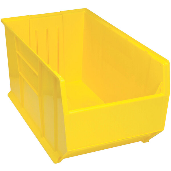 A Quantum yellow plastic bin with a lid.