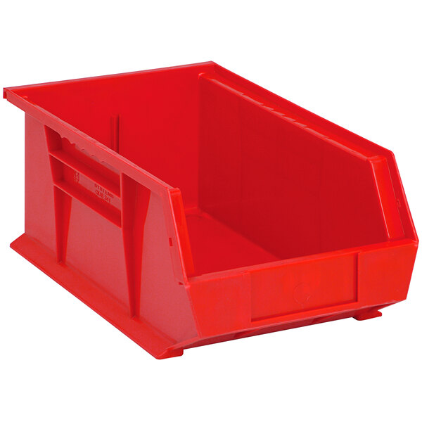 A red plastic Quantum hanging bin with a handle.