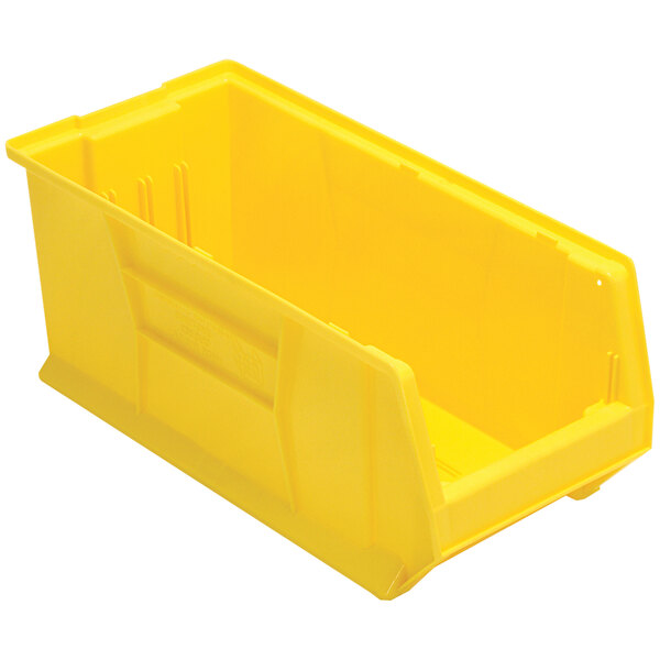 A yellow plastic Quantum storage bin with a handle.