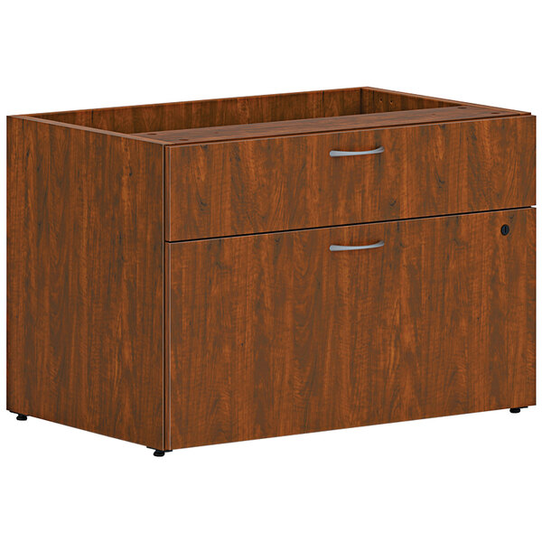 A wooden HON Russet Cherry personal credenza with 2 drawers.