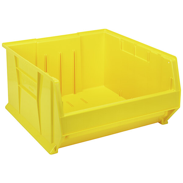 A Quantum yellow plastic bin.