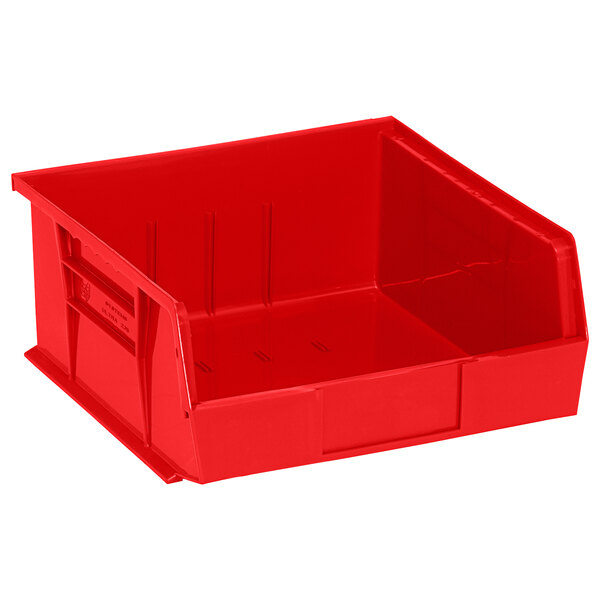 A red Quantum hanging bin with a handle.
