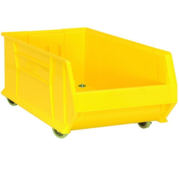 A Quantum yellow plastic container with wheels.