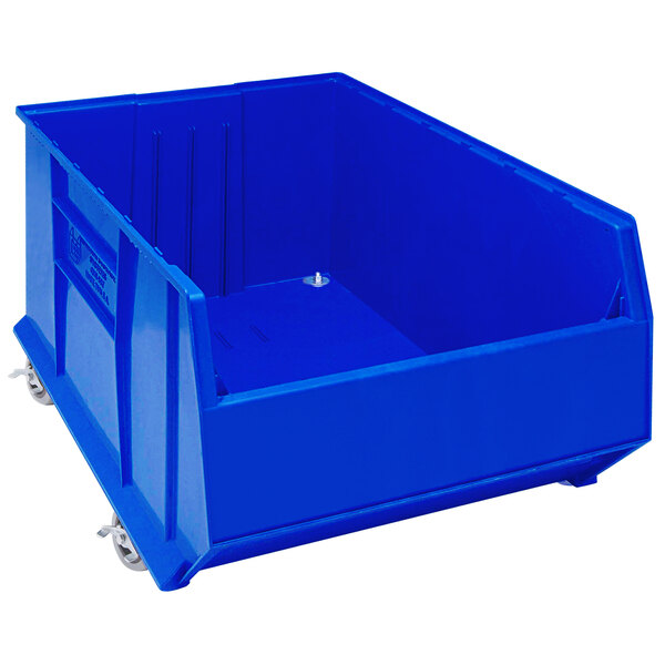 A Quantum blue plastic storage bin with wheels.