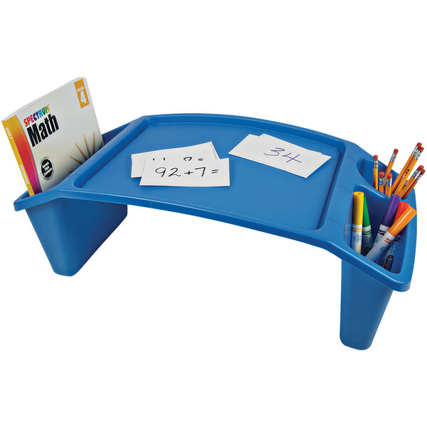A blue Deflecto kids lap tray with papers on it.
