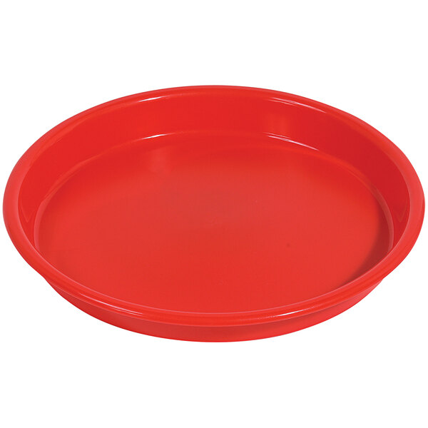 A red round plastic tray with a lid.