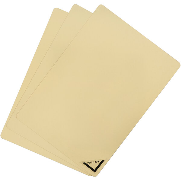 Three beige cards with black corners on a white Deflecto craft sheet.