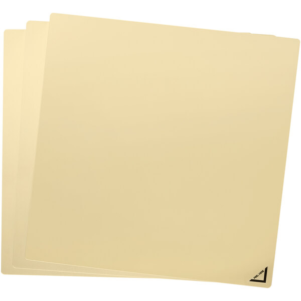 A stack of three gold acrylic craft sheets.