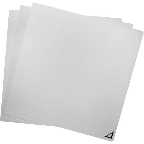 A stack of white Deflecto acrylic craft sheets.