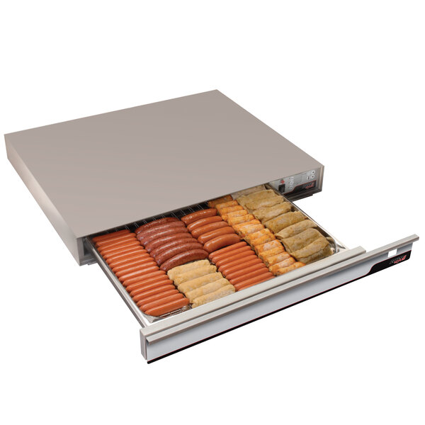An APW Wyott hot dog drawer filled with hot dogs and sausages.
