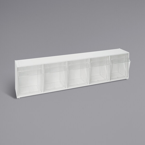 A white rectangular object with clear plastic drawers.