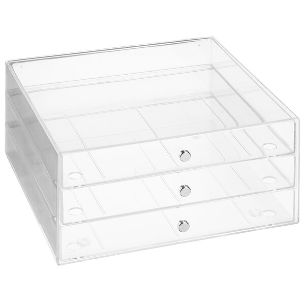 A clear plastic box with three drawers.