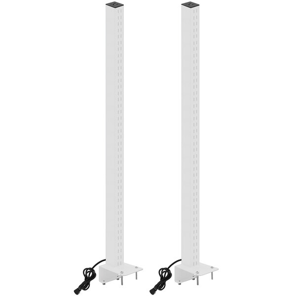 A pair of white metal BenchPro uprights with power plugs.