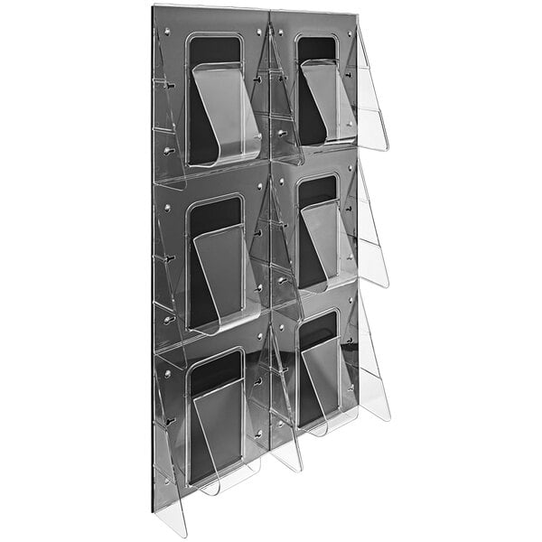 A black metal Deflecto wall mount magazine rack with six clear plastic pockets.