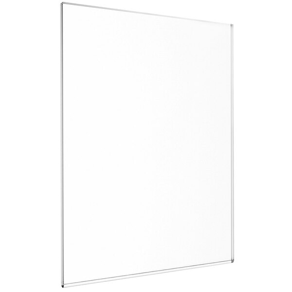 A white rectangular object with a black border on a white wall.