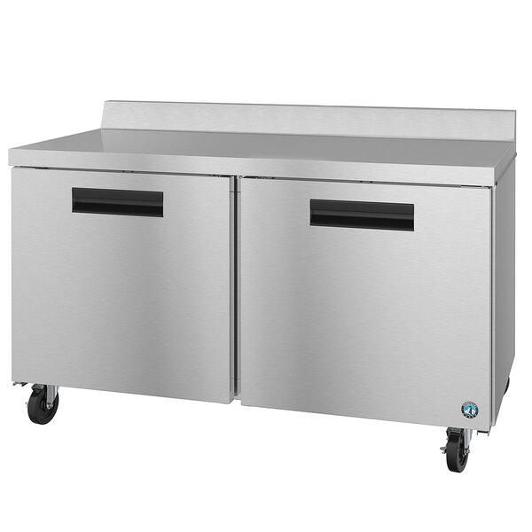 A Hoshizaki stainless steel worktop refrigerator with two doors.