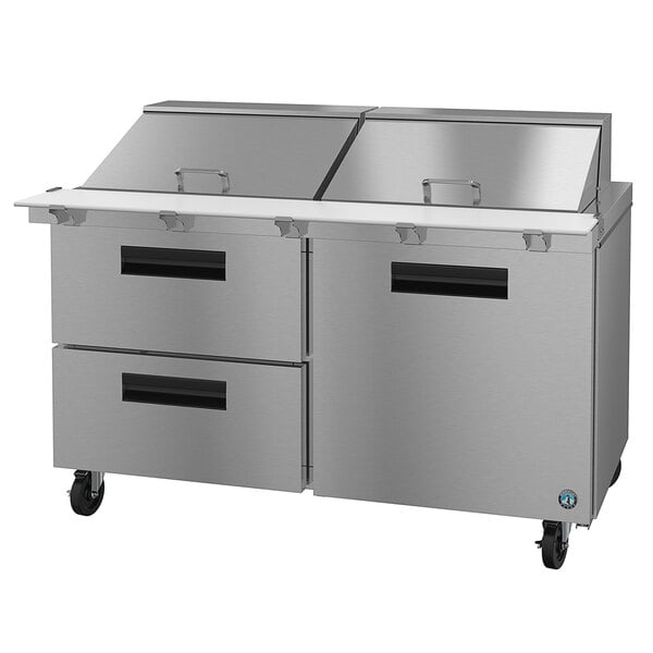A Hoshizaki stainless steel mega top refrigerated prep table with one door and two drawers.
