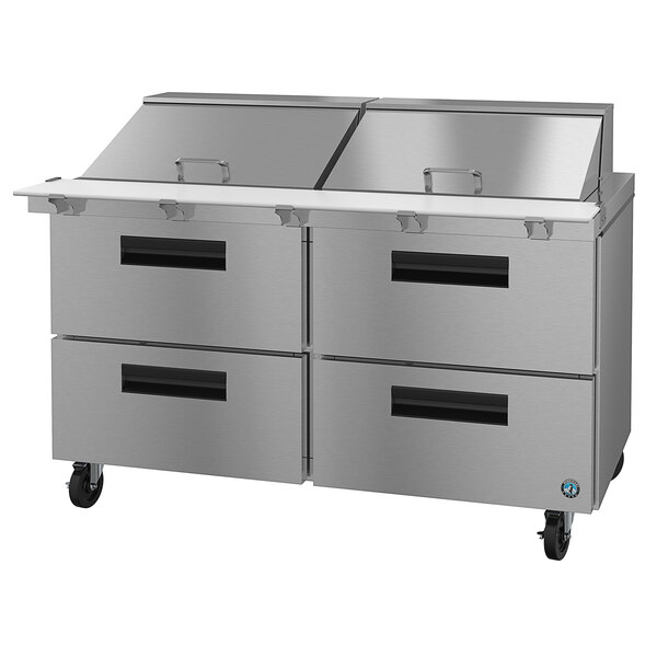 A Hoshizaki stainless steel mega top prep table with drawers.