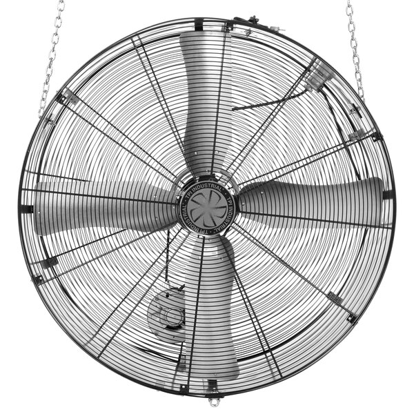 A close-up of a TPI belt drive suspension blower with chains hanging from it.